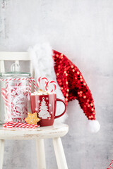 Christmas Decoration, Santa Claus Hat And Wooden Chair.