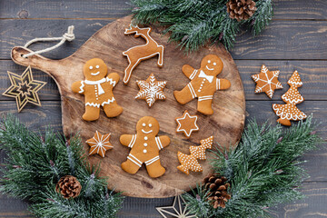 Homemade christmas gingerbread cookies on wooden table.