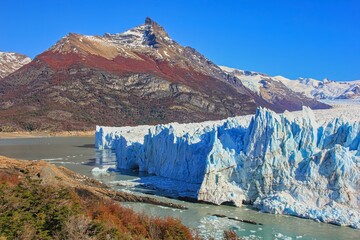 Scenic panoramic view to the unique gigantic melting Perito Moreno glacier, in Santa Cruz Province,Patagonia, Argentina. Global Warming,Global Climate Change.