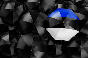 Umbrella with Estonian flag among black umbrellas, 3D rendering