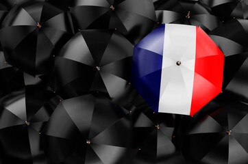 Umbrella with French flag among black umbrellas, 3D rendering