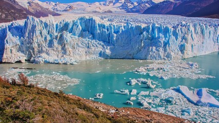 Scenic panoramic view to the gigantic melting Perito Moreno glacier. Melting Beauty,the Icefields of Patagonia,Santa Cruz Province, Argentina.