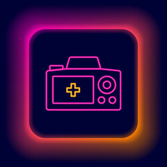 Glowing neon line Photo camera icon isolated on black background. Foto camera. Digital photography. Colorful outline concept. Vector