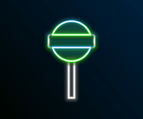 Glowing neon line Lollipop icon isolated on black background. Food, delicious symbol. Colorful outline concept. Vector