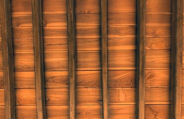 The ceiling of a joglo house, a traditional Javanese house, Indonesia, made of high grade teak wood and handmade carvings