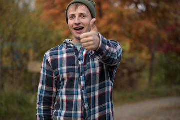 Happy day man. Autumn background. Man. Male. Autumn