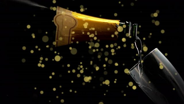 Animation of golden dots over champagne pouring into glass