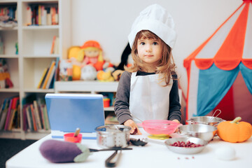 Cute Adorable Little Chef Playing in Mini Kitchen