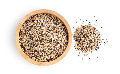Pile of mixed raw quinoa in wood bowl isolated on white background