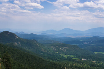 Photo viewing out from pikes peak. Hazy mountains