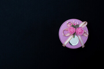 Christmas gift boxes isolated on black background, except copy space.