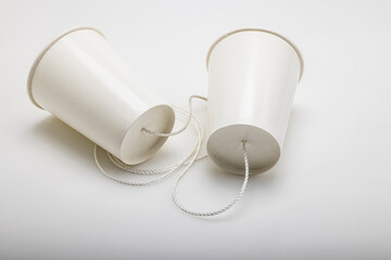 Kid telephone made from paper cups , children's experiments on communication