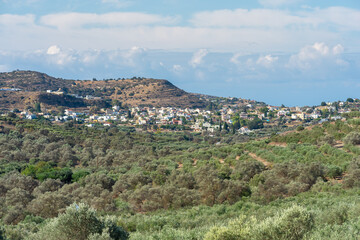 Fototapeta na wymiar View to the village Pitsidia, located hillside near the mediterranean sea and at the end of Messara plain in the south of Crete. Despite the tourism it has kept its original rural character