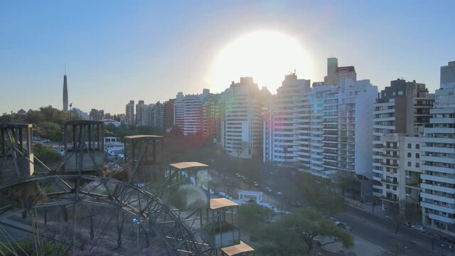 Aerial reveal of the famous Eiffel Wheel landmark in Cordoba, Argentina