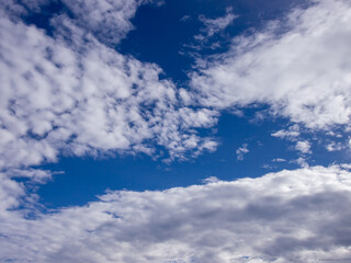 white clouds with blue sky