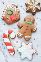 Christmas gingerbread cookies on white marble background