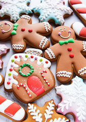 Christmas gingerbread cookies on white marble background