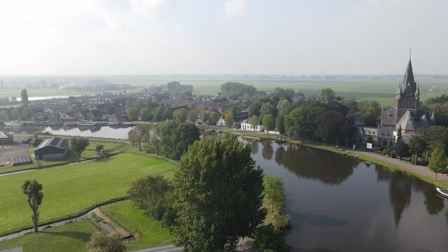 Aerial view of Amstelveen Oudekerk ad Amstel typical dutch landscape and historic village along the Amstel river in The Netherlands.