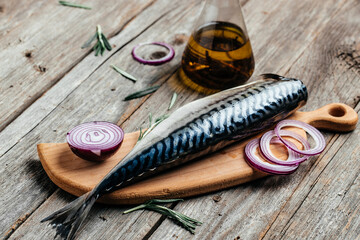 Delicious fresh sea Atlantic mackerel fish on wooden background. Restaurant menu, dieting, cookbook recipe