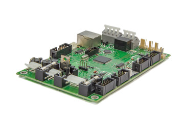 Isolated image of a green printed circuit board assembly. PCB production industry for...