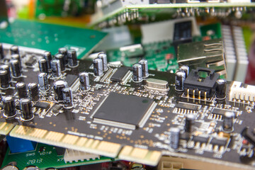 Selective focus. Old printed circuit boards for recycling, utilization. Recast of Electronics and PCB with Components