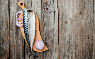 Raw fresh mackerel fish on wooden table. Seafood concept. banner, menu, recipe place for text, top view