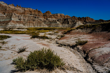 A dry stream is a reminder of the erosion that creates the landscape of Badlands National Park in South Dakota