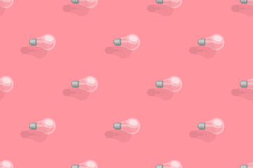 Light bulbs seamless pattern. Background on the theme of light bulbs and lighting.