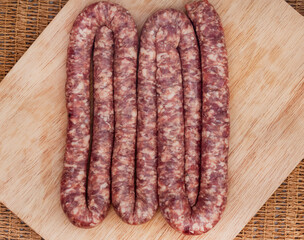 lamb boerewors or sausage, raw with mint garnish