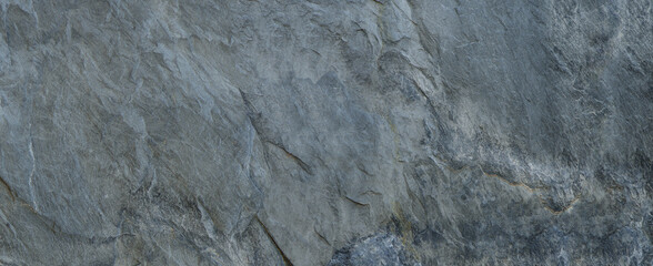 The texture of the stone wall. Close-up. Light gray rock backdrop.