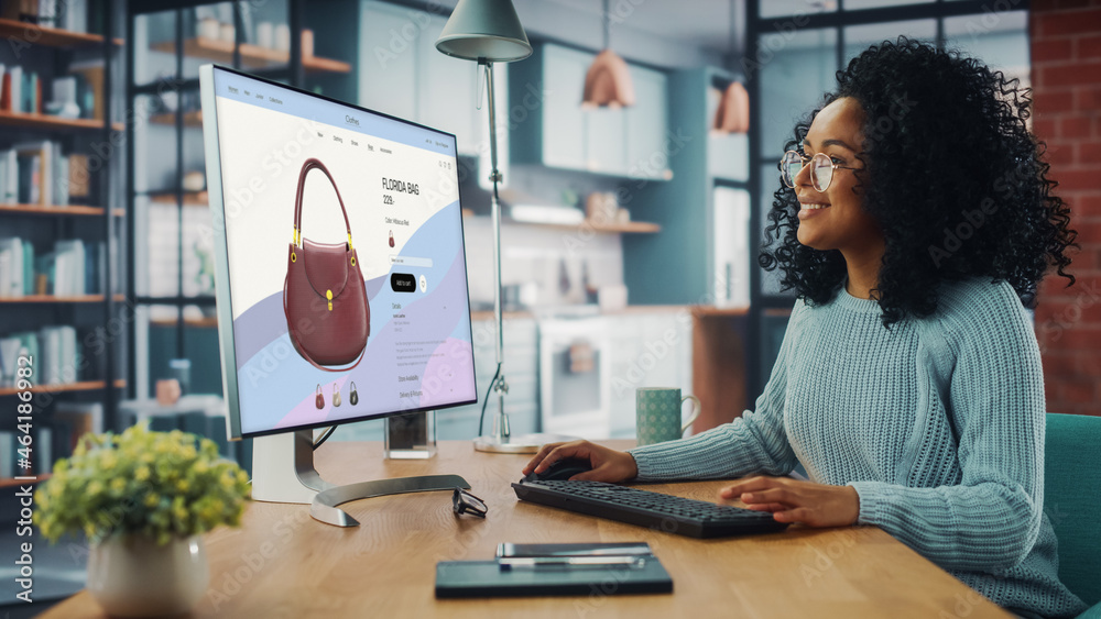 Poster latina female using desktop computer with clothing online web store to choose and buy clothes from n