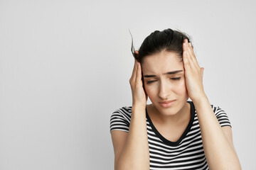 brunette headache painful syndrome discomfort light background