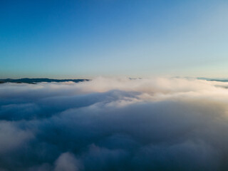 Fototapeta na wymiar aerial view above the clouds