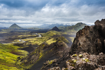Beautiful Icelandic landscape with mountains, sky and clouds. Trekking in national park...