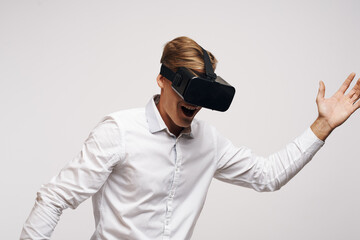 portrait of a man in a white shirt vr glasses gadget device video technology studio