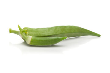 Close-up of organic green fresh Okra or ladies' fingers fruits(  Abelmoschus esculentus )  isolated over white background