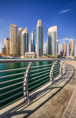 Obraz na płótnie Canvas Day view of Dubai Marina bay with bridge, UAE