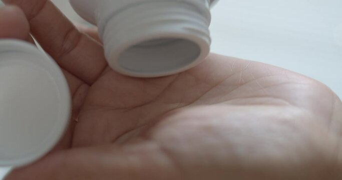 Pouring opiates Into hand, Slow motion
