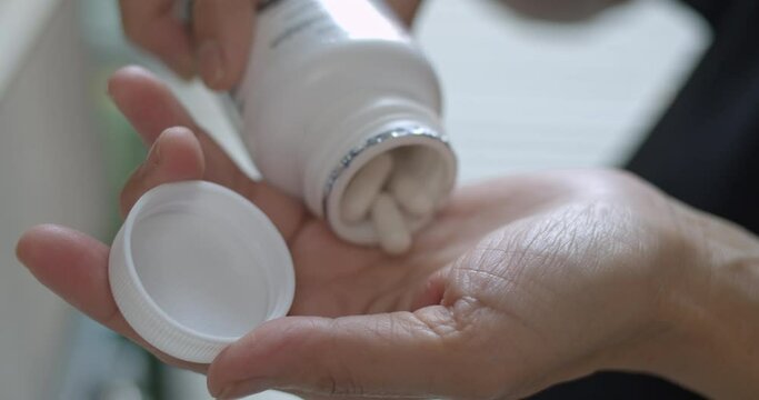 Pouring opiates Into hand, Slow motion