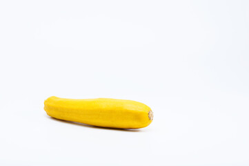 One yellow zucchini isolated on white background	