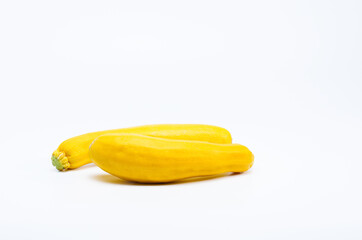 Yellow zucchinis  squash on a white background	
