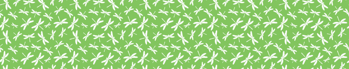 Green seamless pattern with white dragonflies