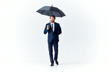 business man in a suit manager office work umbrella in hand