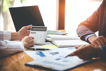 Fototapeta premium Team work with business analytic price chart on the table at the conference room.