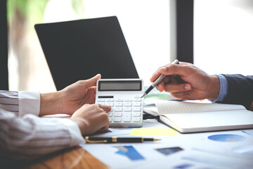 Team work with business analytic price chart on the table at the conference room.