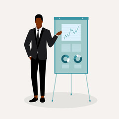 Young Professional Black Businessman Presenting With A Flipchart.