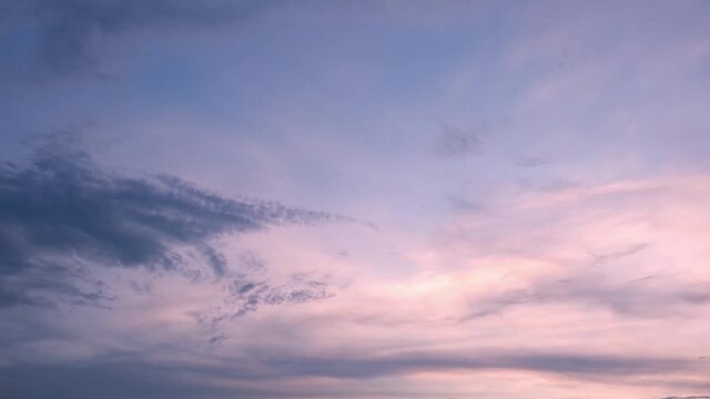 4K Sky Time lapse, Beautiful background, Sky Timelapse of skyscrapers. Romantic colorful sunset. Sun go down, blue and orange clouds flow in sky. Majestic summer landscape. Exploring beauty world, tr