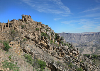 Ancient abandoned Gamsutl village at the top of the mountain peak in Dagestan Russia