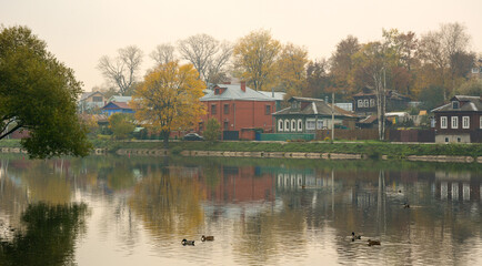 Fototapeta na wymiar Autumn lake scenery in Suzdal Town, Russia