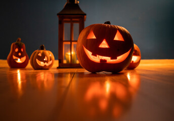 spooky Jack O' Lanterns on wooden table Glowing In Fantasy Night. Halloween Background